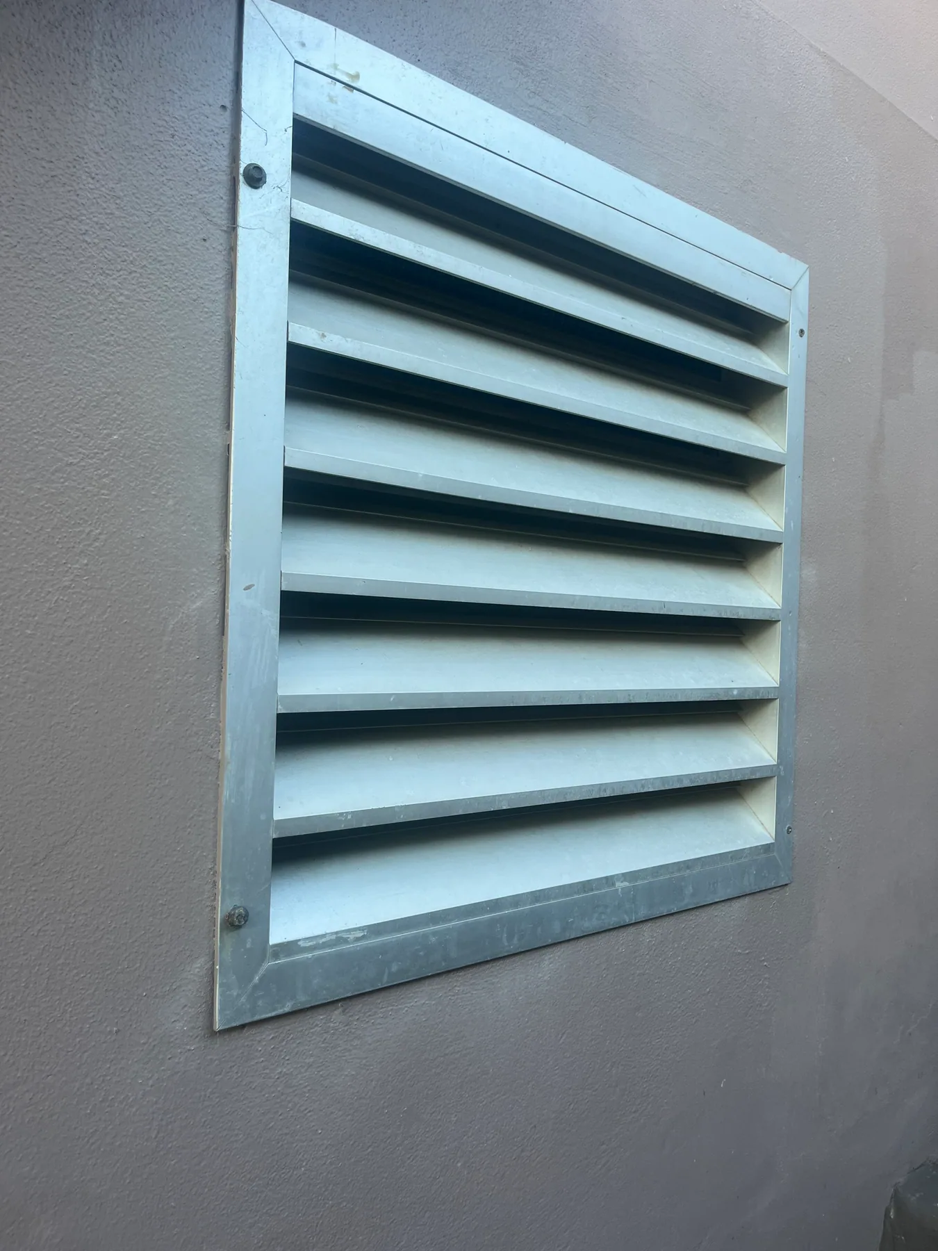 External wall louvre used as part of a subfloor ventilation project in Longueville